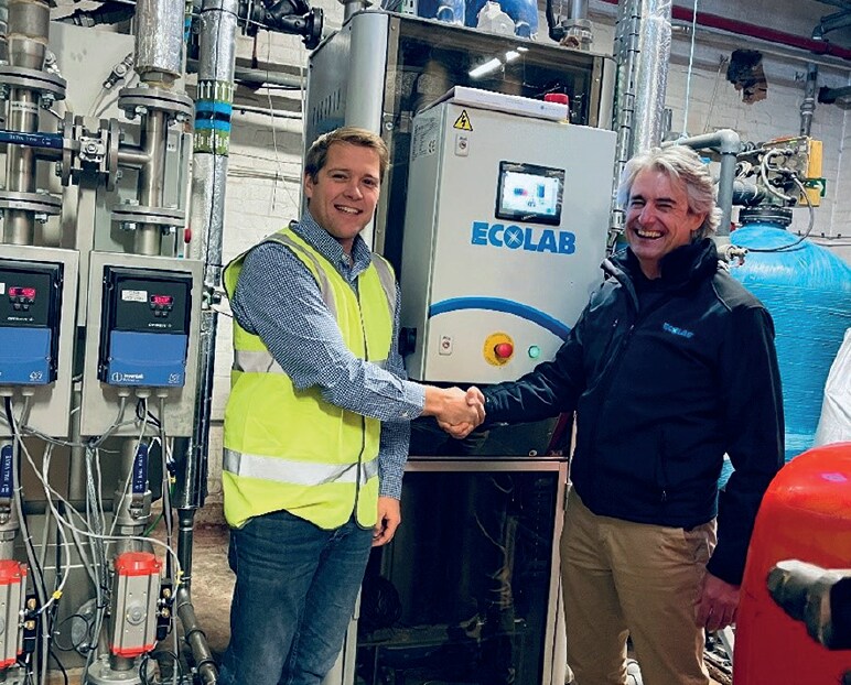 Ecolab associate and customer shaking hands
